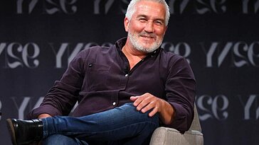 Voyez Paul Hollywood recevoir la distinction « la plus excellente » du Royaume-Uni pour sa carrière au « Great British Baking Show »